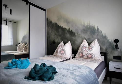 Katil atau katil-katil dalam bilik di Apartament Ryś