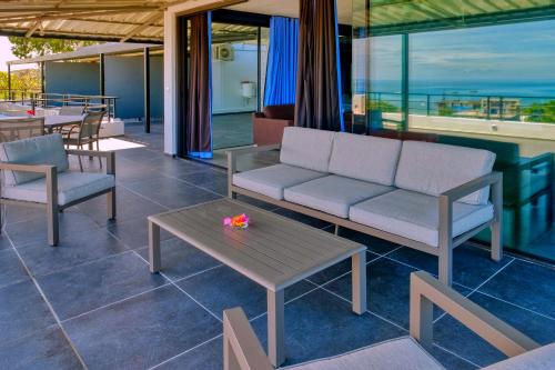 Balkón nebo terasa v ubytování Hôtel Villa Les Orchidées