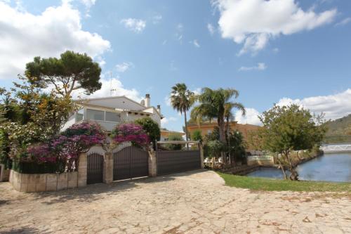 Tropical garden, villa with pool near the beach