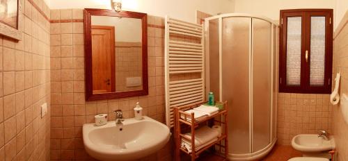 a bathroom with a sink and a shower at il giardino sul mare B&B in Riva Ligure