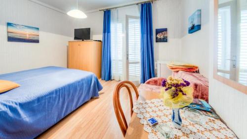 Postel nebo postele na pokoji v ubytování Guest House Villa Nina