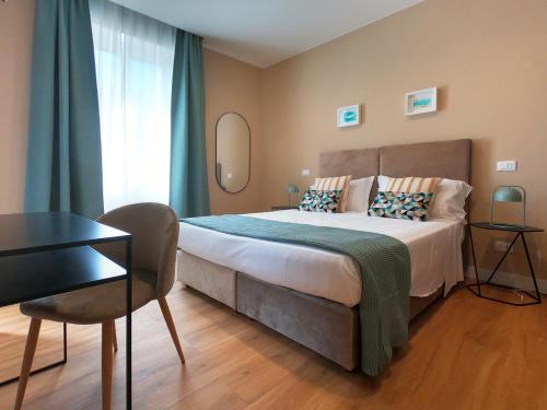 Postel nebo postele na pokoji v ubytování BeA Guest House