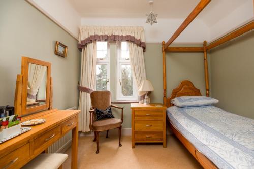 Ένα ή περισσότερα κρεβάτια σε δωμάτιο στο Chestnut Grove Bed And Breakfast
