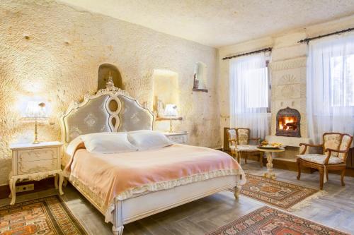 Cama o camas de una habitación en Cappadocia Minia Cave Hotel