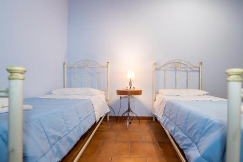 Postel nebo postele na pokoji v ubytování Villa Sajonara Elvira