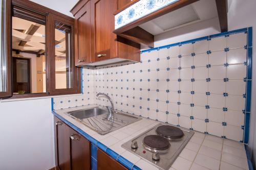 Kuchyň nebo kuchyňský kout v ubytování Villa Sajonara Elvira