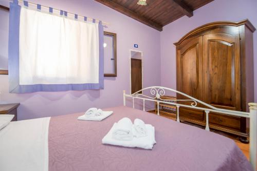 Postel nebo postele na pokoji v ubytování Villa Sajonara Elvira