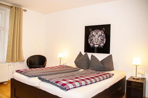 Un pat sau paturi într-o cameră la Ferienwohnung Simon