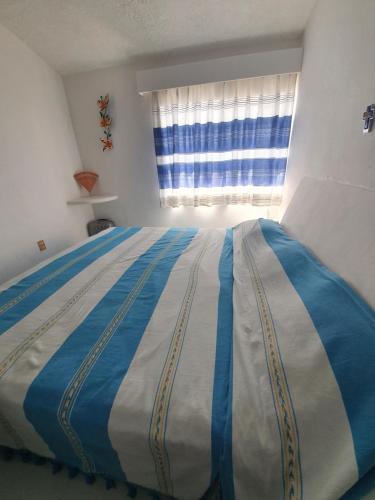 Una cama o camas en una habitación de La mejor ubicación. A unas cuadras del centro