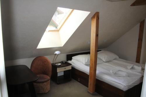 Postel nebo postele na pokoji v ubytování Pensjonacik ELMI