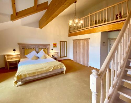 Postel nebo postele na pokoji v ubytování Hotel Sonnenhof Aspach
