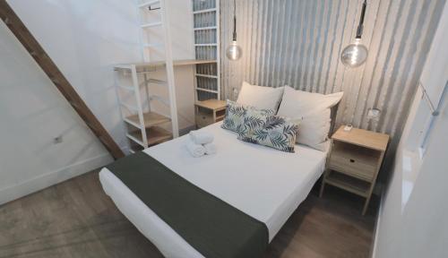 Posteľ alebo postele v izbe v ubytovaní Apartamento Malasaña II