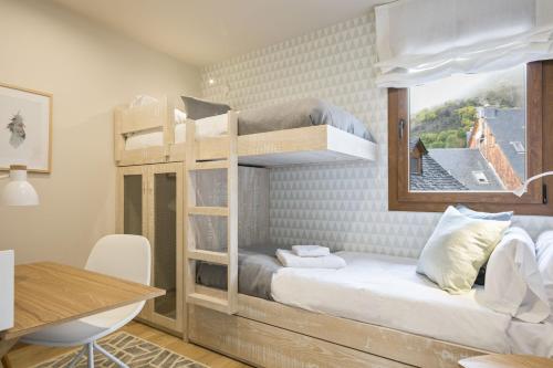 Postel nebo postele na pokoji v ubytování Luderna - Apartamento Dera Airola
