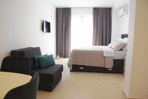 Кровать или кровати в номере Apartments Petar