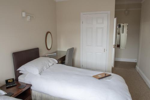 Toothbrush Rooms at Lattice Lodge - Guest Kitchen & EV Rechargingにあるベッド