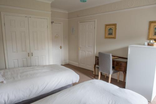 Toothbrush Rooms at Lattice Lodge - Guest Kitchen & EV Rechargingにあるベッド