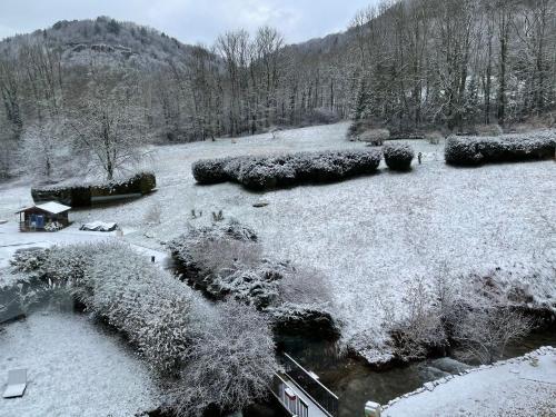 an aerial view of a field covered in snow at Domaine Du Moulin Vallée Heureuse in Poligny