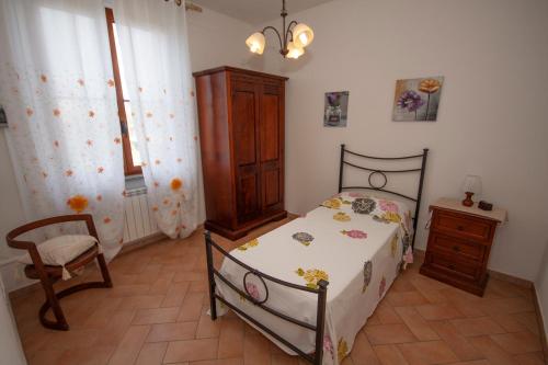 Ένα ή περισσότερα κρεβάτια σε δωμάτιο στο Vacanze Maria Stella