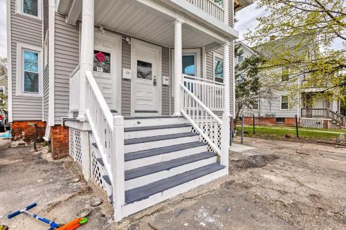 a house with a white porch with stairs on it at Cozy-Chic Attleboro Apt 1 Mi to Dining and Zoo in Attleboro