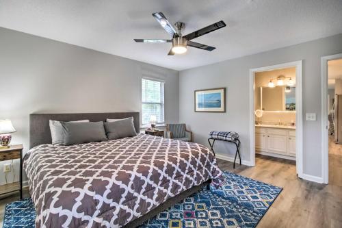 a bedroom with a bed and a ceiling fan at Ideally Located Luxe Beach House on Tybee Island in Tybee Island