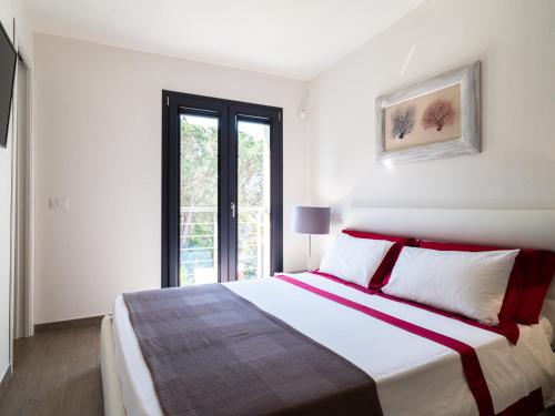Ένα ή περισσότερα κρεβάτια σε δωμάτιο στο WLofts 11, 12 & 14 by Klodge