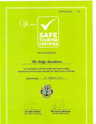 a green certificate with aire tourism certified logo on it at The Ridge Residence in Victoria