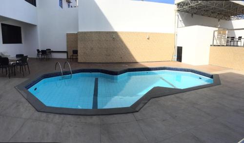Bazén v ubytování Hotel Algas Marinhas nebo v jeho okolí