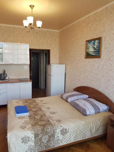 Ένα ή περισσότερα κρεβάτια σε δωμάτιο στο Апартаменты Берег Черного моря