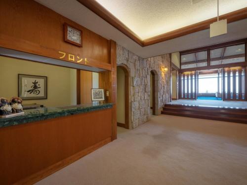 a lobby with a bar in a building at Lake View Inaedaiso - Vacation STAY 34438v in Inawashiro