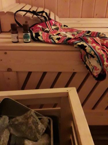a bed with a blanket on top of a table at Logis Hôtel Château De Palaja in Carcassonne