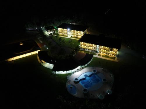 an overhead view of a building with lights at night at Hotel Campestre Paraiso Cafetero in Montenegro