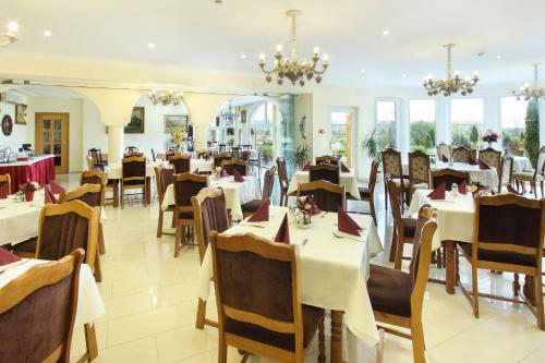 En restaurant eller et spisested på Barokk Hotel
