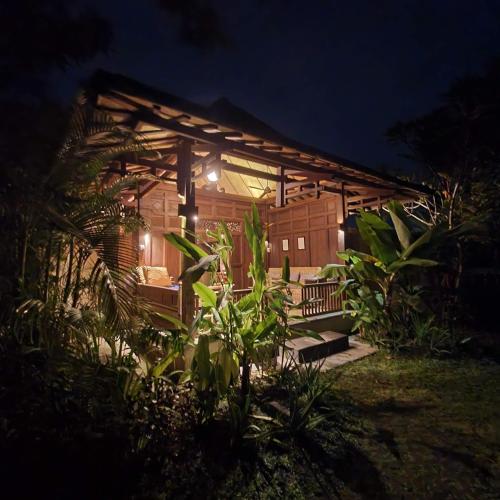 a house at night with lights on it at Yabbiekayu in Yogyakarta