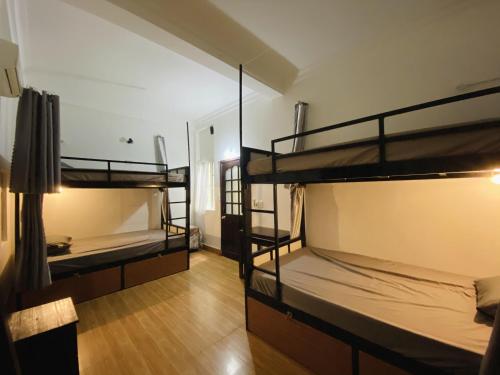Postel nebo postele na pokoji v ubytování bititi dorm