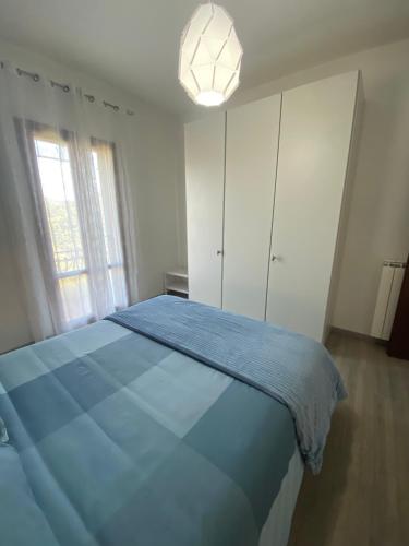 Ένα ή περισσότερα κρεβάτια σε δωμάτιο στο Casato Clavelli 1