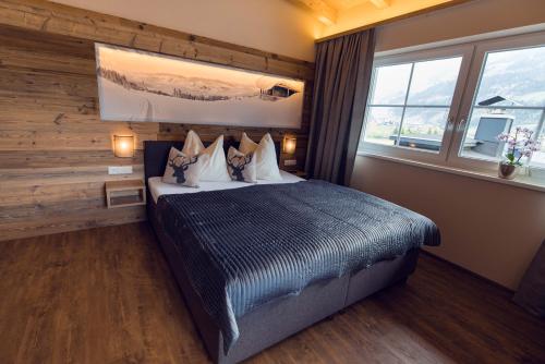 Una cama o camas en una habitación de Chalet Arena
