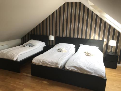 Säng eller sängar i ett rum på Apartament Beige