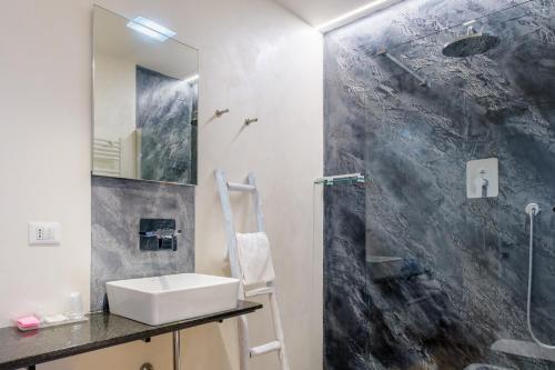Koupelna v ubytování Tempobiancosuites