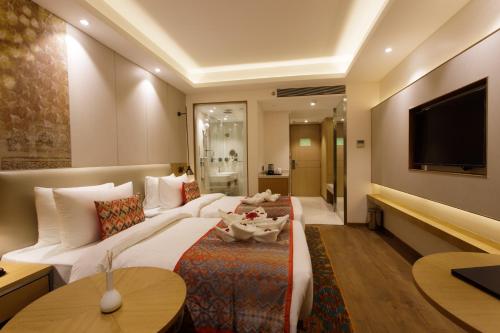 Cama o camas de una habitación en Sayaji Jamnagar