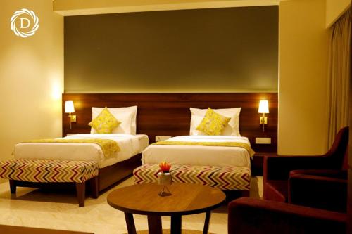 Ένα ή περισσότερα κρεβάτια σε δωμάτιο στο Hotel Daani Continental