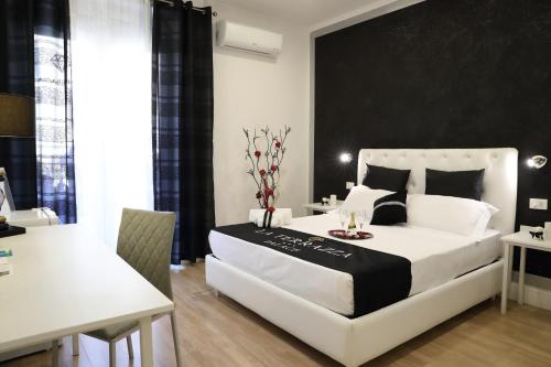 Posteľ alebo postele v izbe v ubytovaní La Terrazza Palace B&B