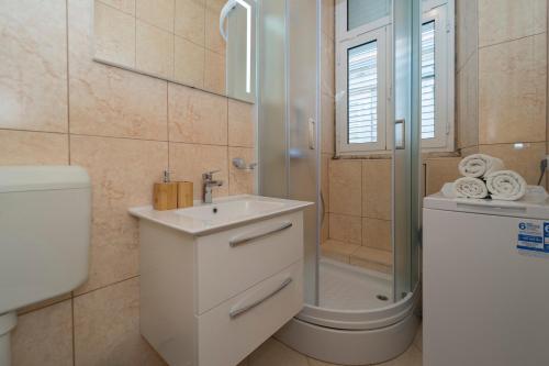 Kúpeľňa v ubytovaní Apartment N central