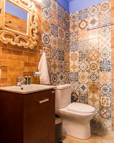 Ένα μπάνιο στο iole boutique house