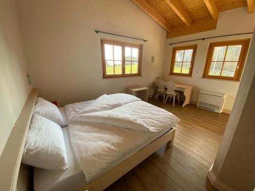 Postel nebo postele na pokoji v ubytování Millennium Stube Locazione Turistica