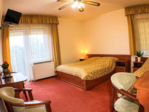 Una cama o camas en una habitación de Villa Gemini