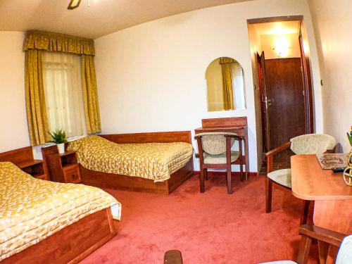 Una cama o camas en una habitación de Villa Gemini