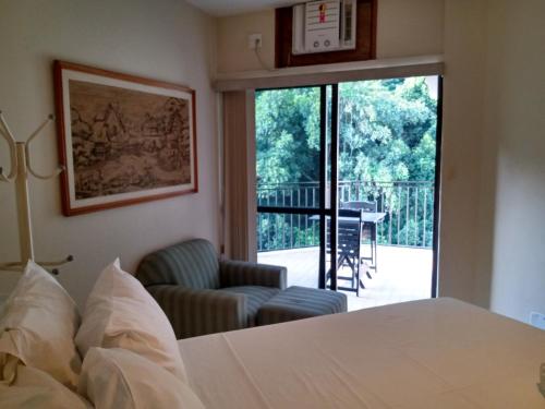 Llit o llits en una habitació de Real Residence Hotel