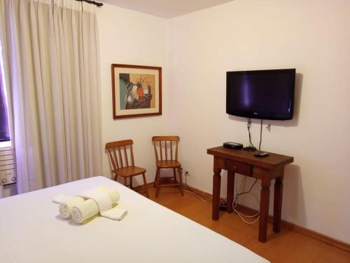 Μια τηλεόραση ή/και κέντρο ψυχαγωγίας στο Real Residence Hotel