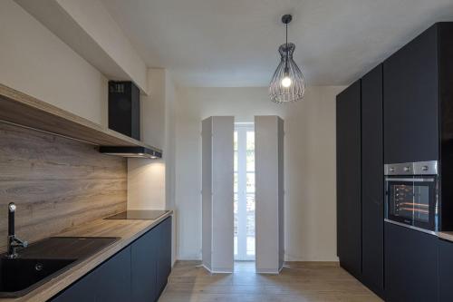 Kuchyň nebo kuchyňský kout v ubytování Mirandola Suites