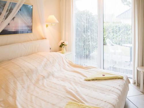 Ein Bett oder Betten in einem Zimmer der Unterkunft Apartment Christina IV by Interhome